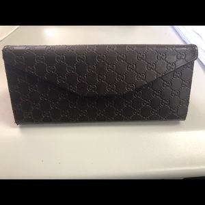 Gucci eye glass case with clean cloth